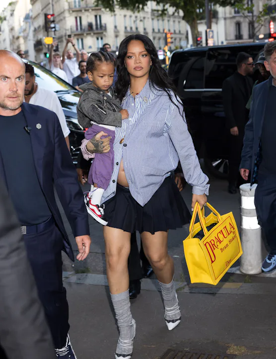 PARIS, FRANCE - JUNE 27: Rihanna and son Riot attend the AWGE Menswear Spring/Summer 2026 show as pa...