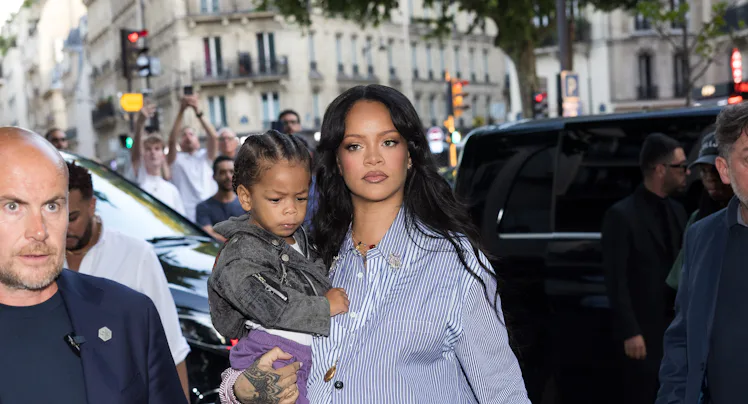 PARIS, FRANCE - JUNE 27: Rihanna and son Riot attend the AWGE Menswear Spring/Summer 2026 show as pa...
