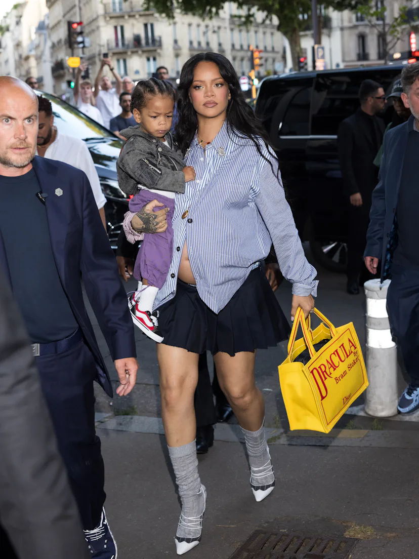 PARIS, FRANCE - JUNE 27: Rihanna and son Riot attend the AWGE Menswear Spring/Summer 2026 show as pa...