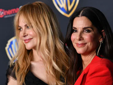 Australian actress/producer Nicole Kidman (L) and US actress/producer Sandra Bullock (R) promote the...