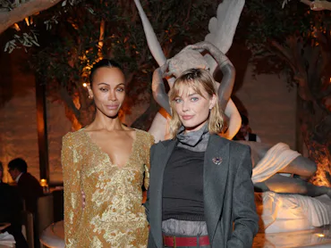 MILAN, ITALY - APRIL 21: Zoe Saldana and Margot Robbie attend the unveiling of "RH Milan, The Galler...