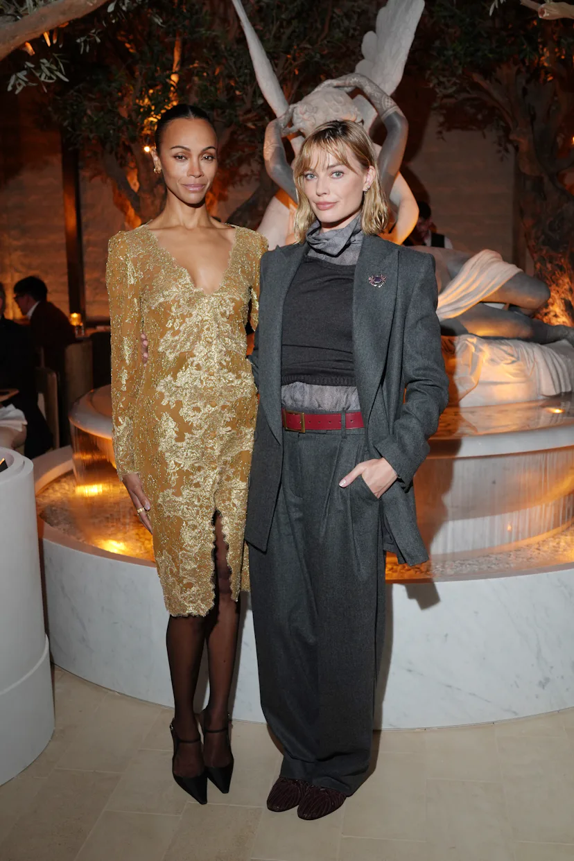 MILAN, ITALY - APRIL 21: Zoe Saldana and Margot Robbie attend the unveiling of "RH Milan, The Galler...