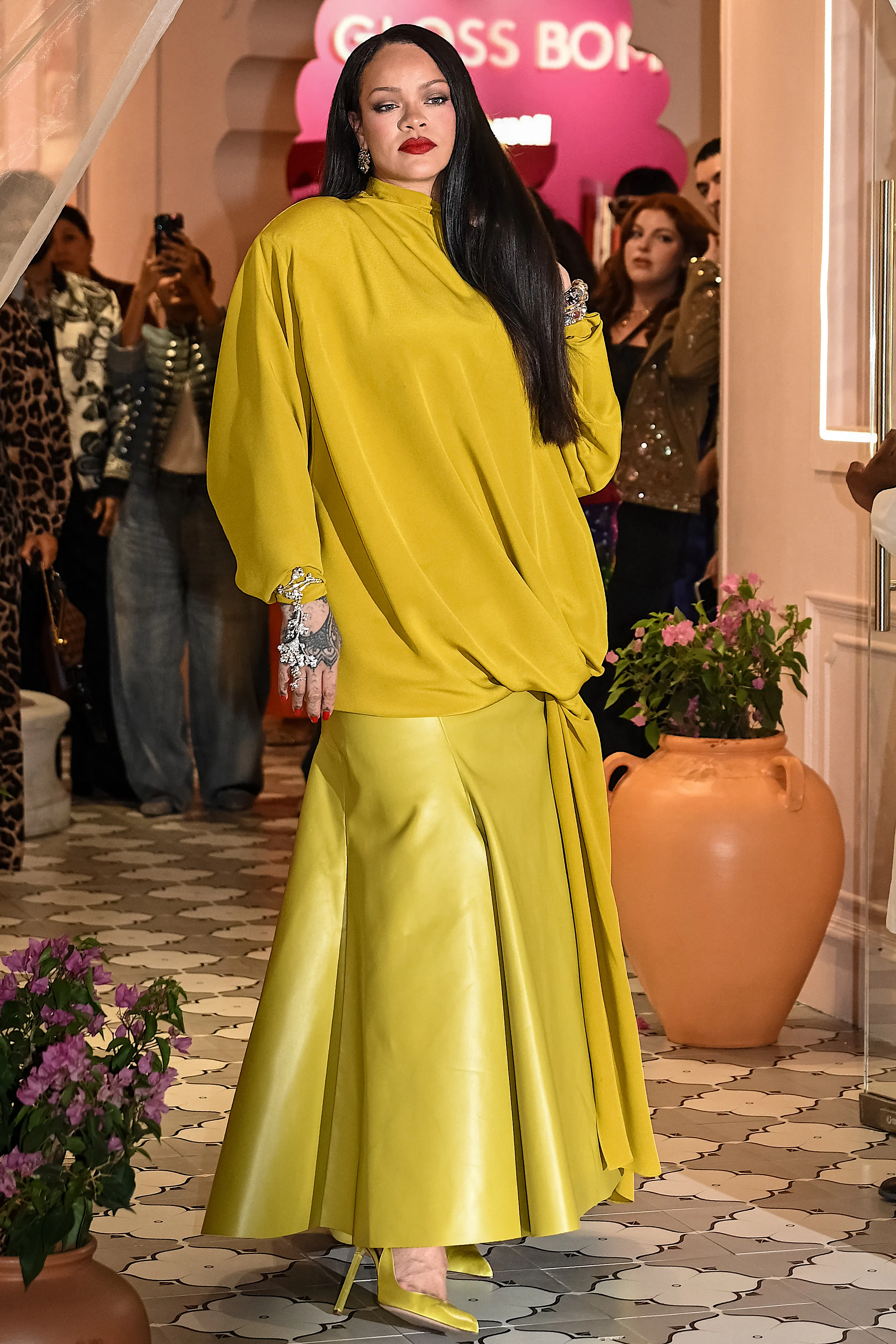 Barbadian singer and actress Rihanna poses for a photograph during the launch of her Fenty Beauty br...