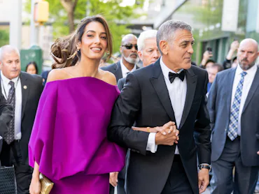 NEW YORK, NEW YORK - APRIL 27: George Clooney (R) and Amal Clooney attend the 51st Chaplin Award Gal...