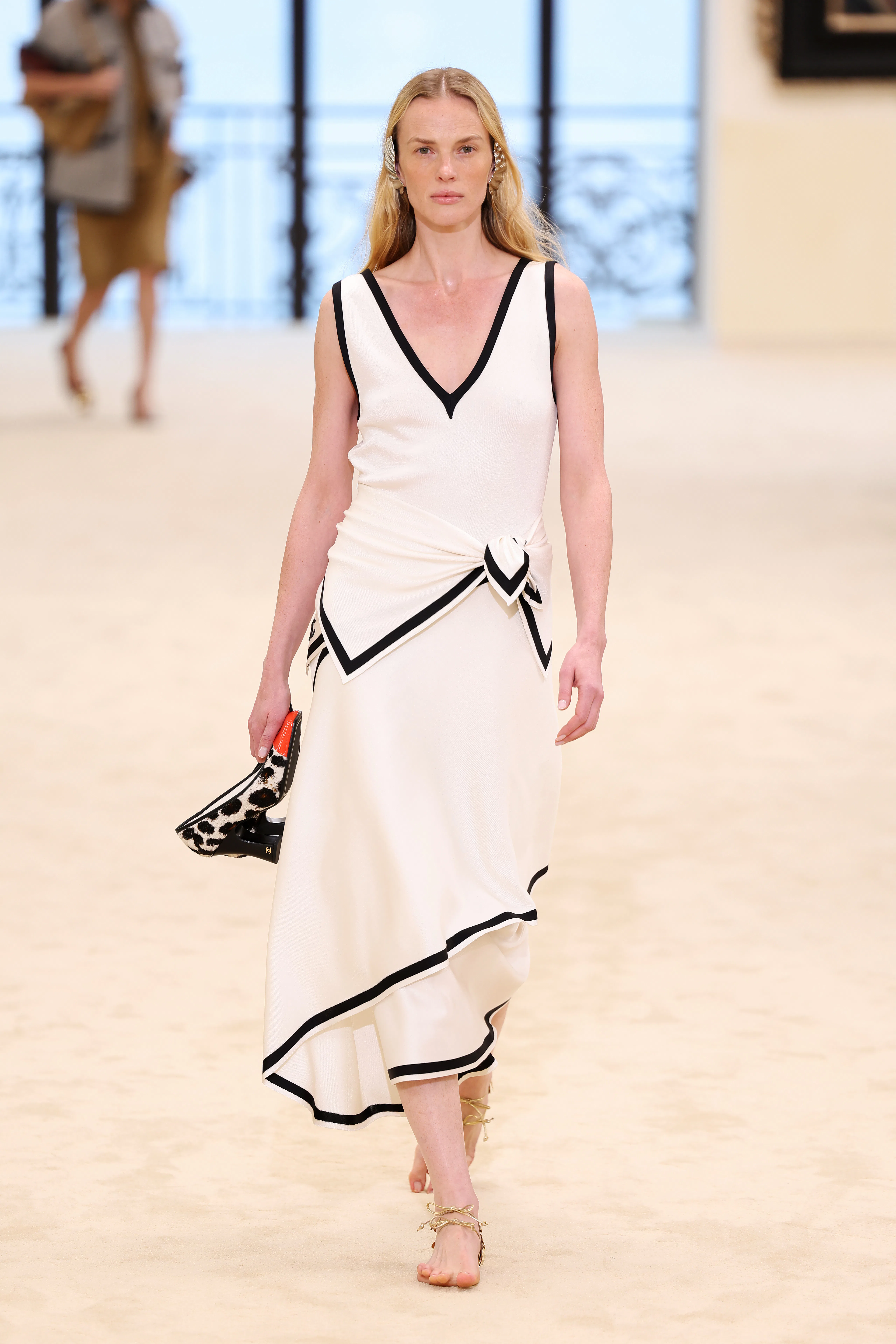 A model walks the runway during the Chanel Cruise 2026/27 