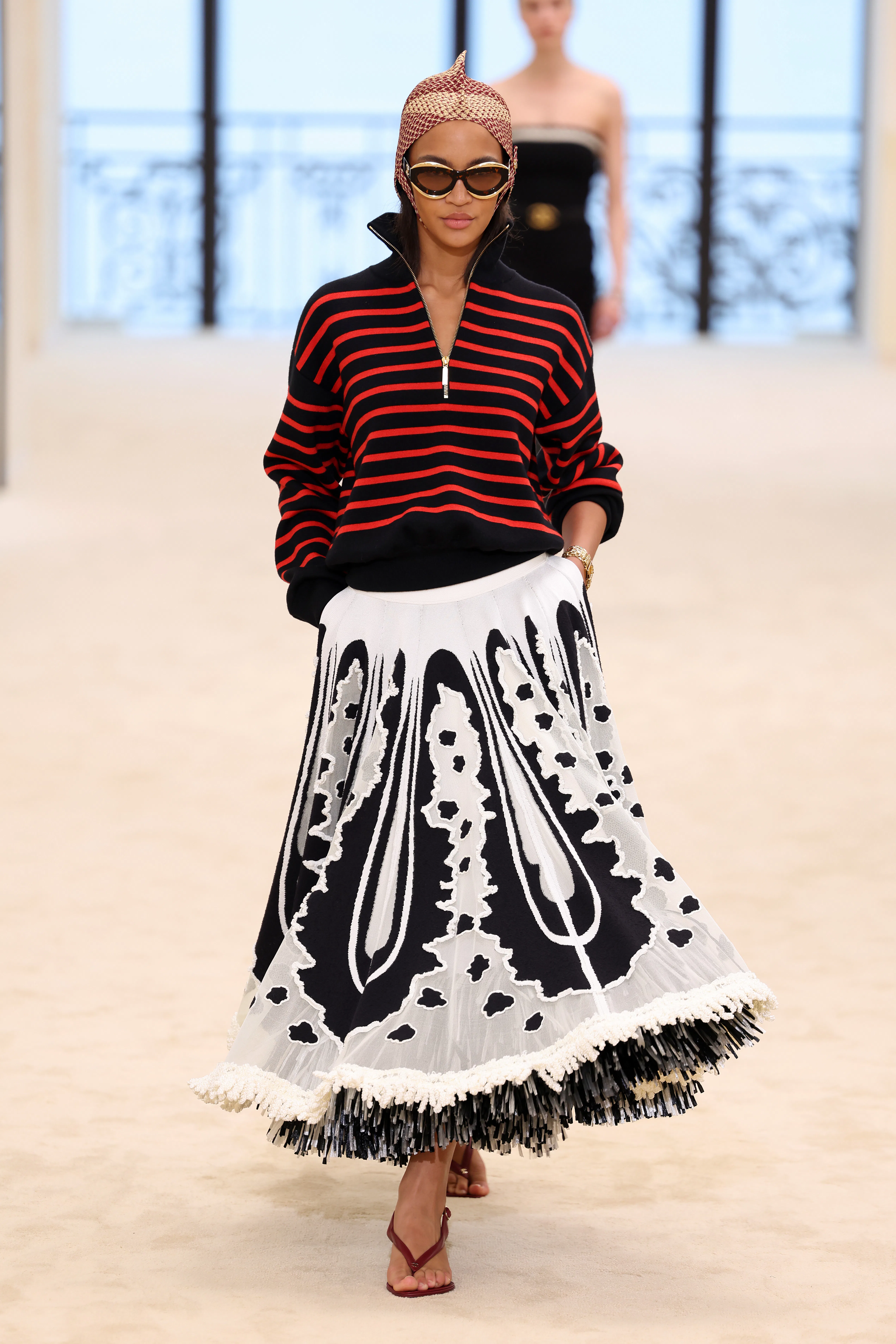 A model walks the runway during the Chanel Cruise 2026/27 