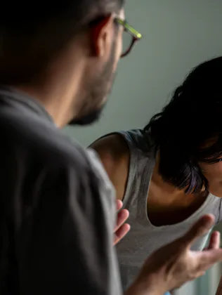 Young Asian married couple after a fight, Angry couple ignoring each other, relationship troubles.