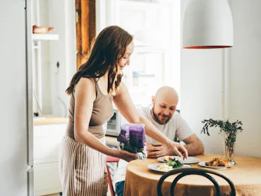 The couple is having breakfast together.