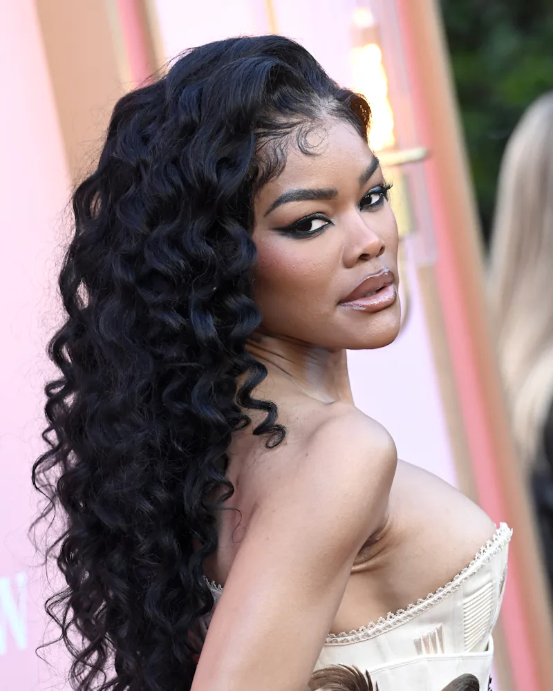Teyana Taylor at Billboard Women in Music with long curly hair
