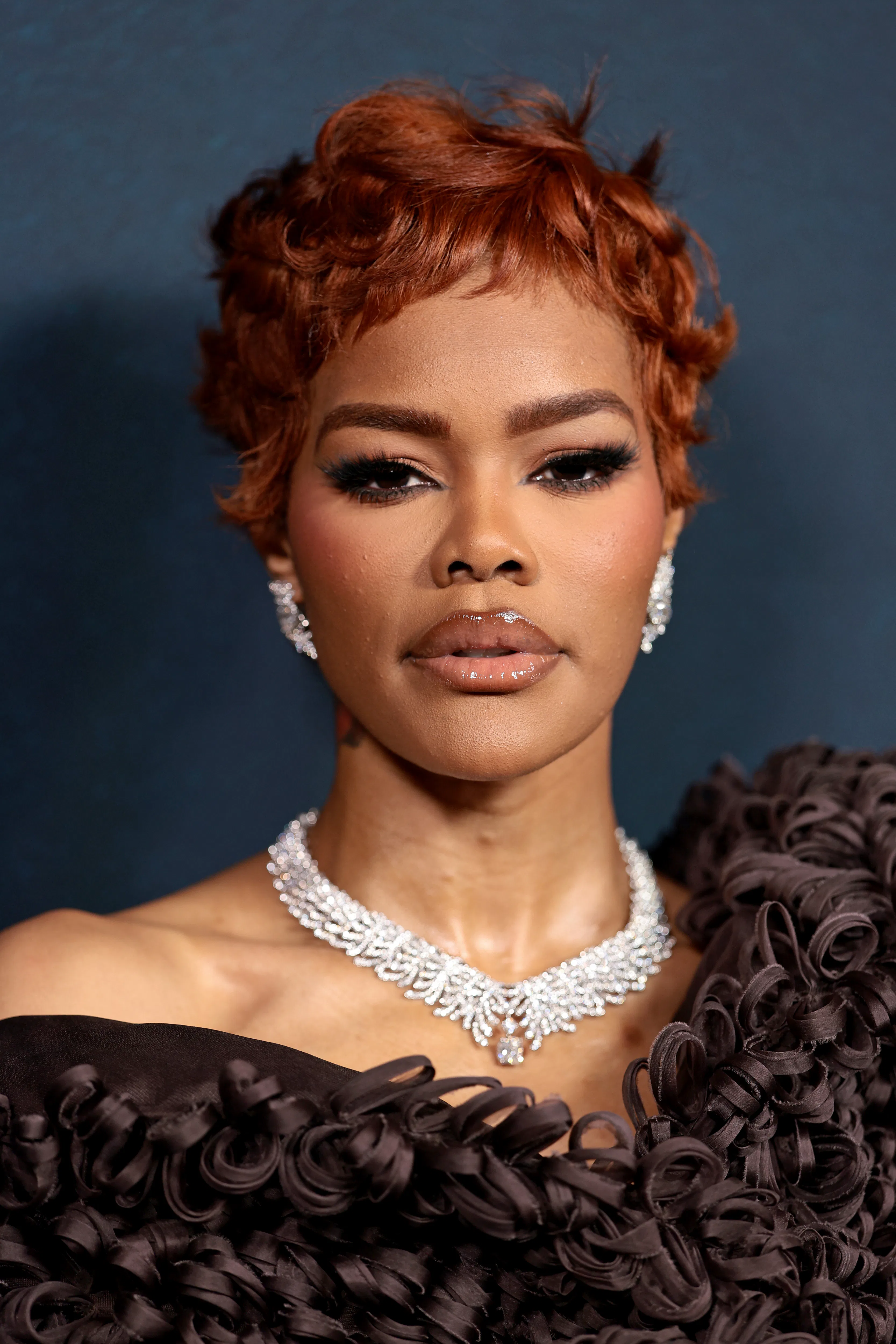 Teyana Taylor with a fiery red pixie cut