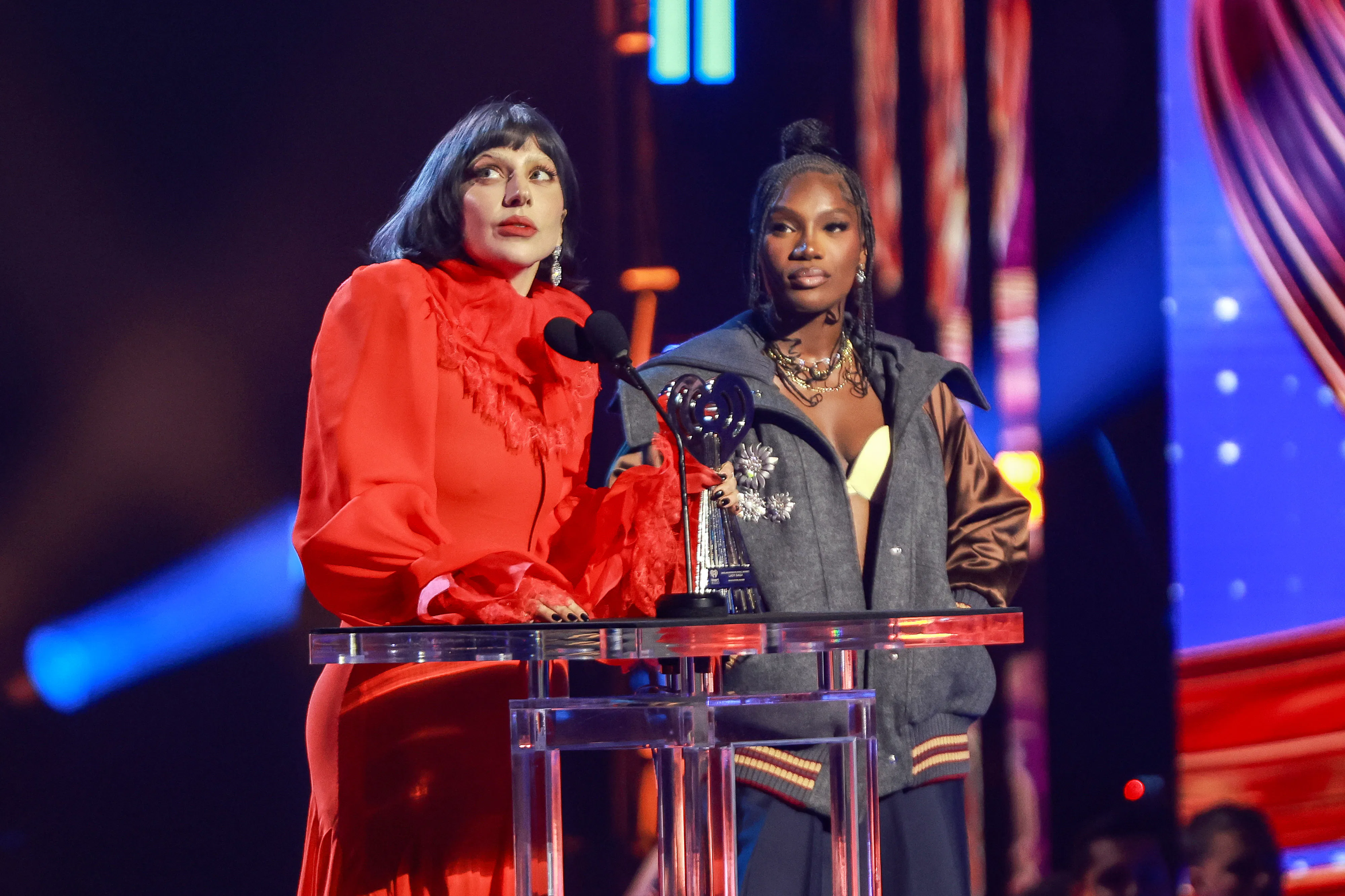 LOS ANGELES, CALIFORNIA - MARCH 17: (FOR EDITORIAL USE ONLY) (L-R) Lady Gaga accepts the Innovator A...