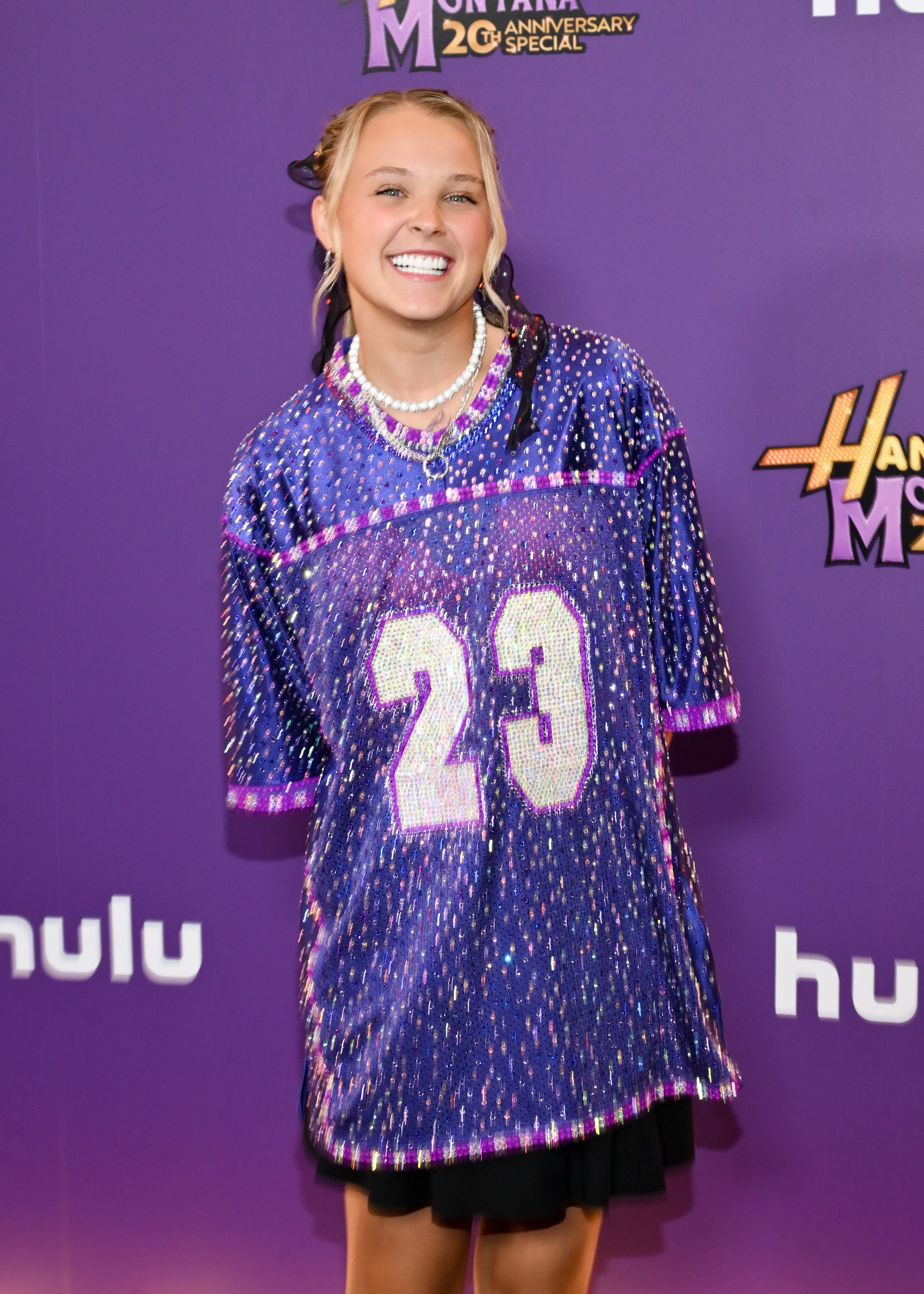 JoJo Siwa opens up about queer identity and Chris Hughes romance.