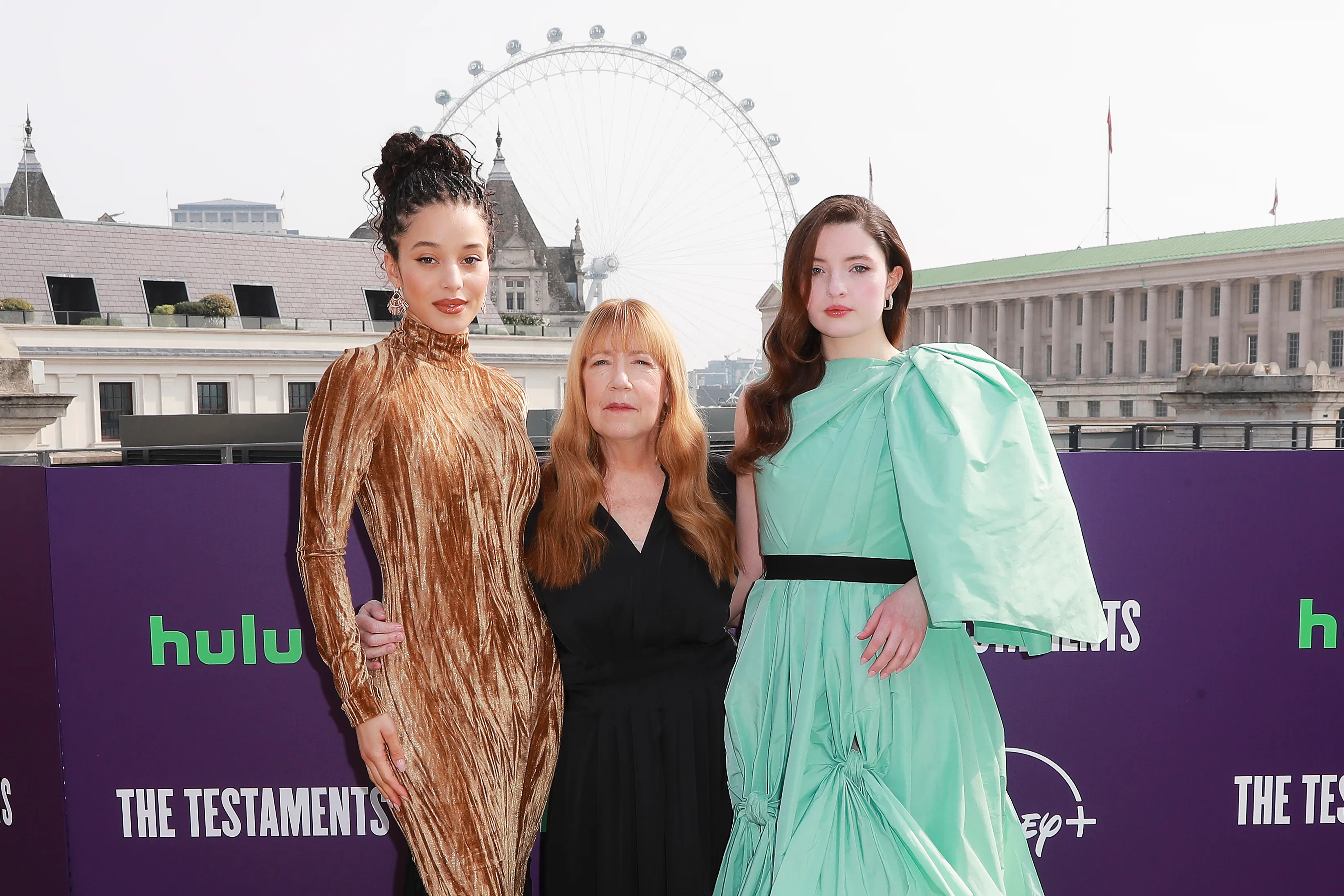 Chase Infiniti (left), Ann Dowd, and Lucy Halliday attend the UK photocall for Hulu's "The Testament...