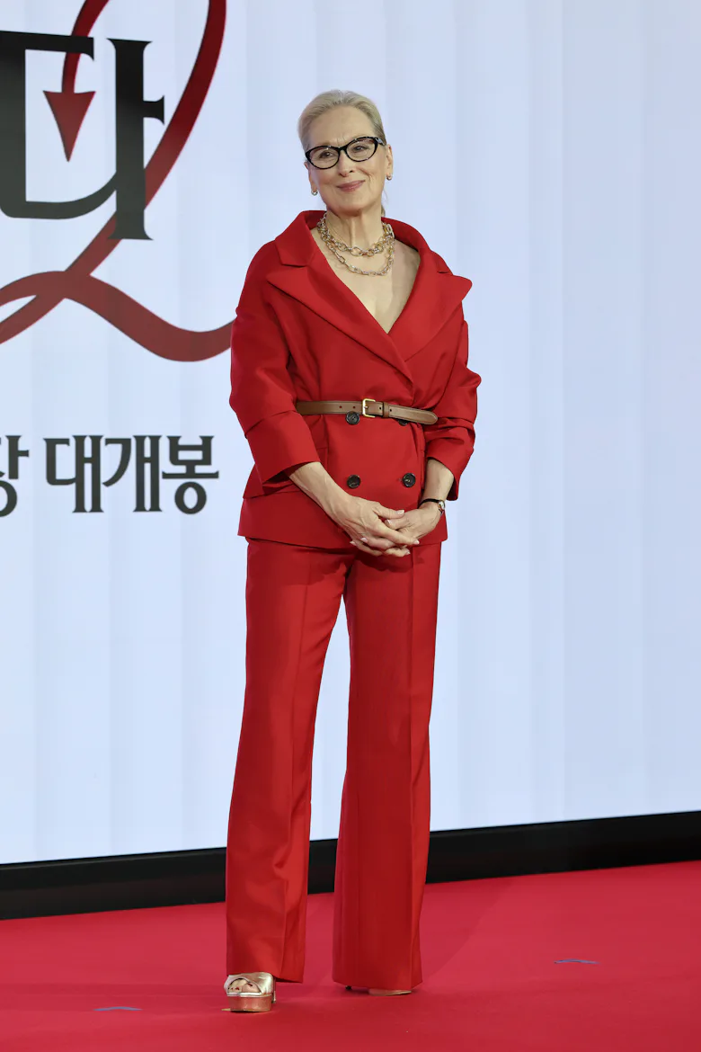meryl streep red dress Meryl Streep wears a custom made Balenciaga gown for the official poster of The Devil Wears Prada 2. She wears an Archive inspired Ballroom Gown in Red Silk Super Taffeta. #Balenciaga #LuxeGalerie