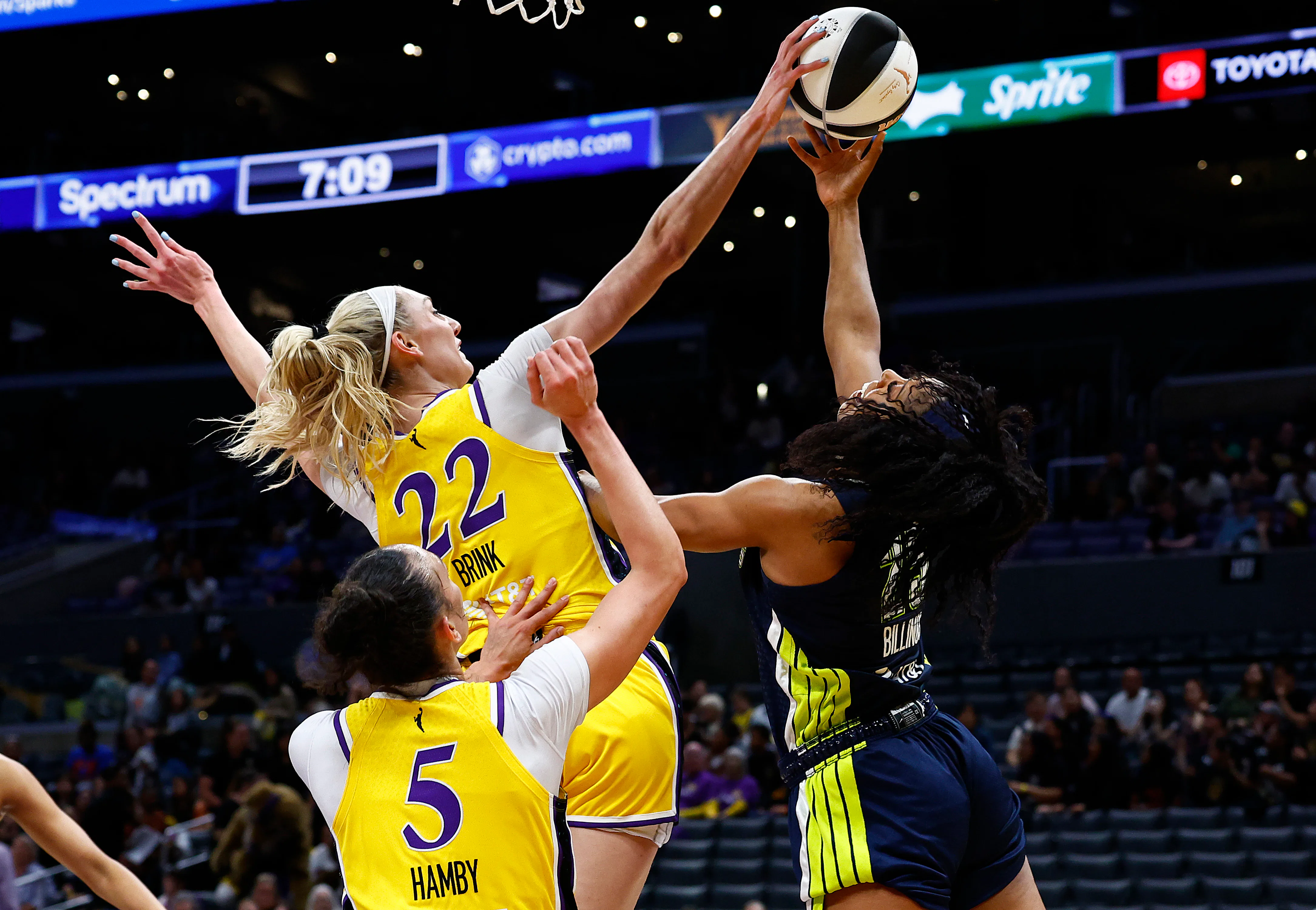 Cameron Brink #22 of the Los Angeles Sparks blocks the shot.