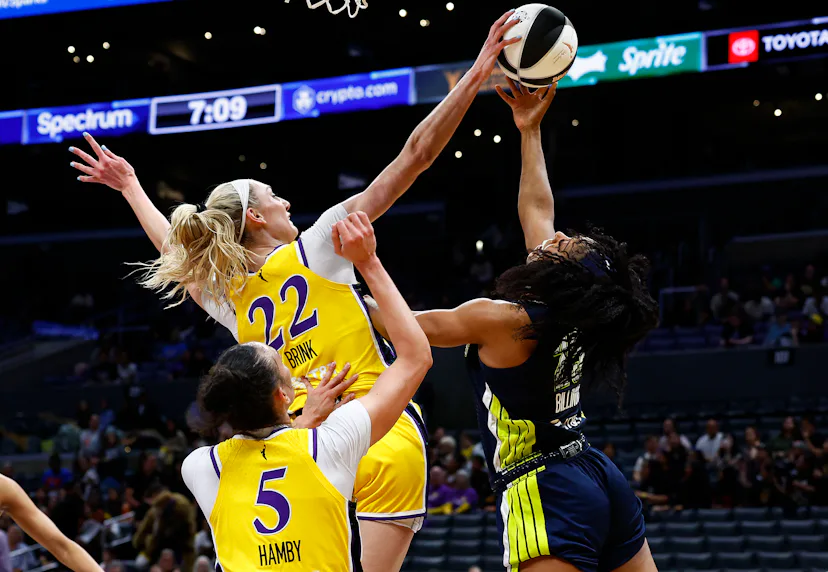 Cameron Brink #22 of the Los Angeles Sparks blocks the shot.