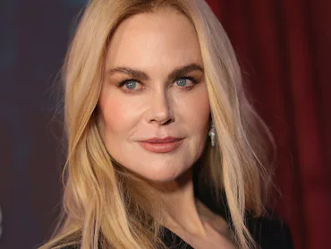 Nicole Kidman with long hair, in a headshot