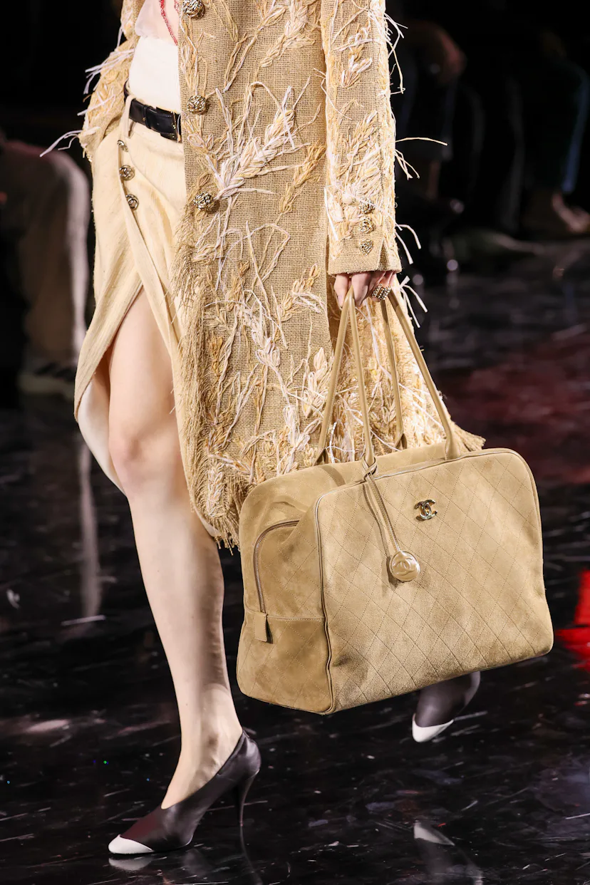 A model walks the runway during the Chanel Womenswear Spring/Summer 2026 show