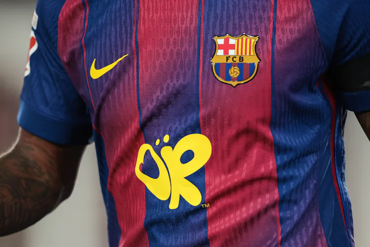 BARCELONA, SPAIN - MAY 10: A close-up of the Barcelona shirt featuring Olivia Rodrigo's logo during...