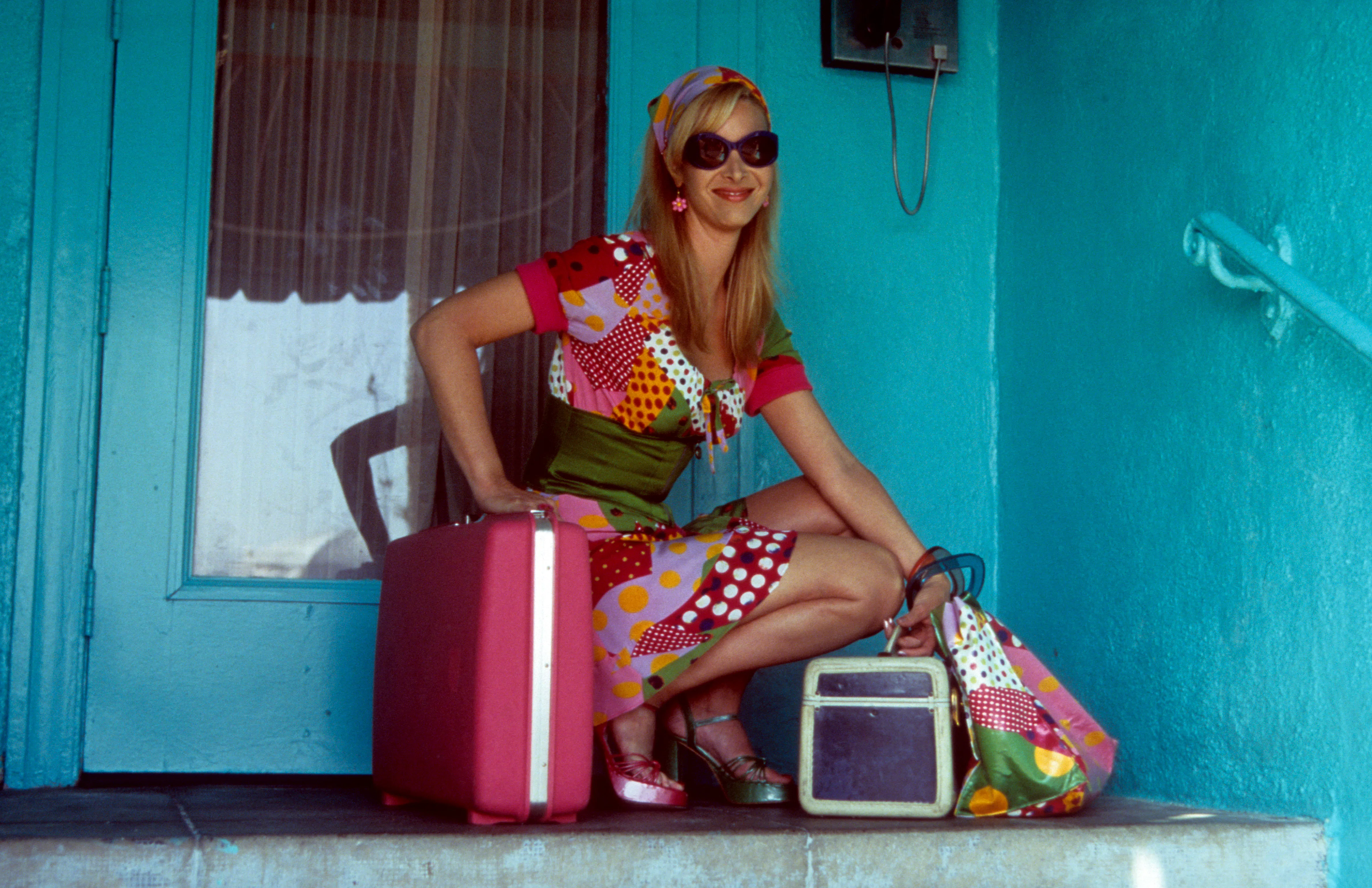 Lisa Kudrow crouching down in a scene from the film 'Romy And Michele's High School Reunion', 1997. ...