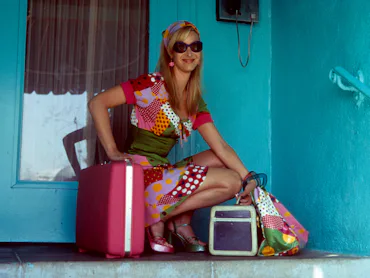 Lisa Kudrow crouching down in a scene from the film 'Romy And Michele's High School Reunion', 1997. ...