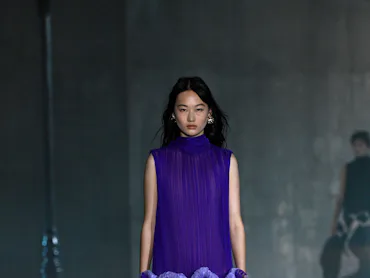 A model walks the runway at the Dior 2027 Cruise Collection Show