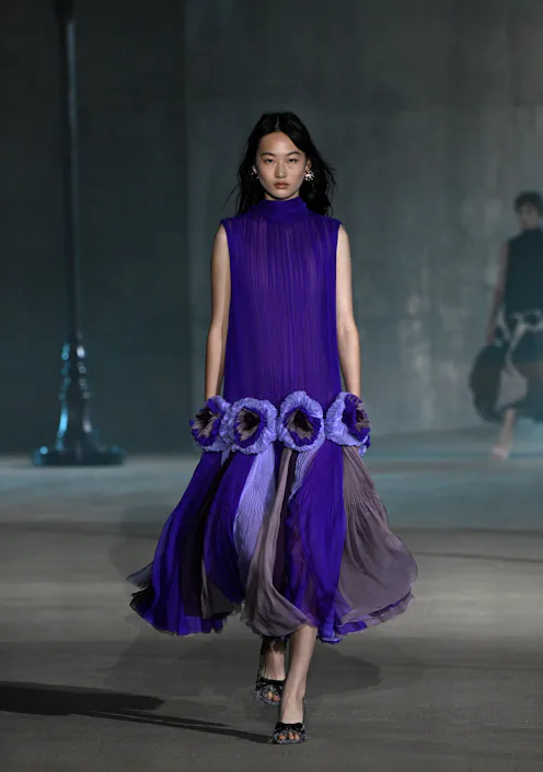 A model walks the runway at the Dior 2027 Cruise Collection Show