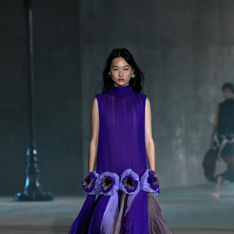 A model walks the runway at the Dior 2027 Cruise Collection Show