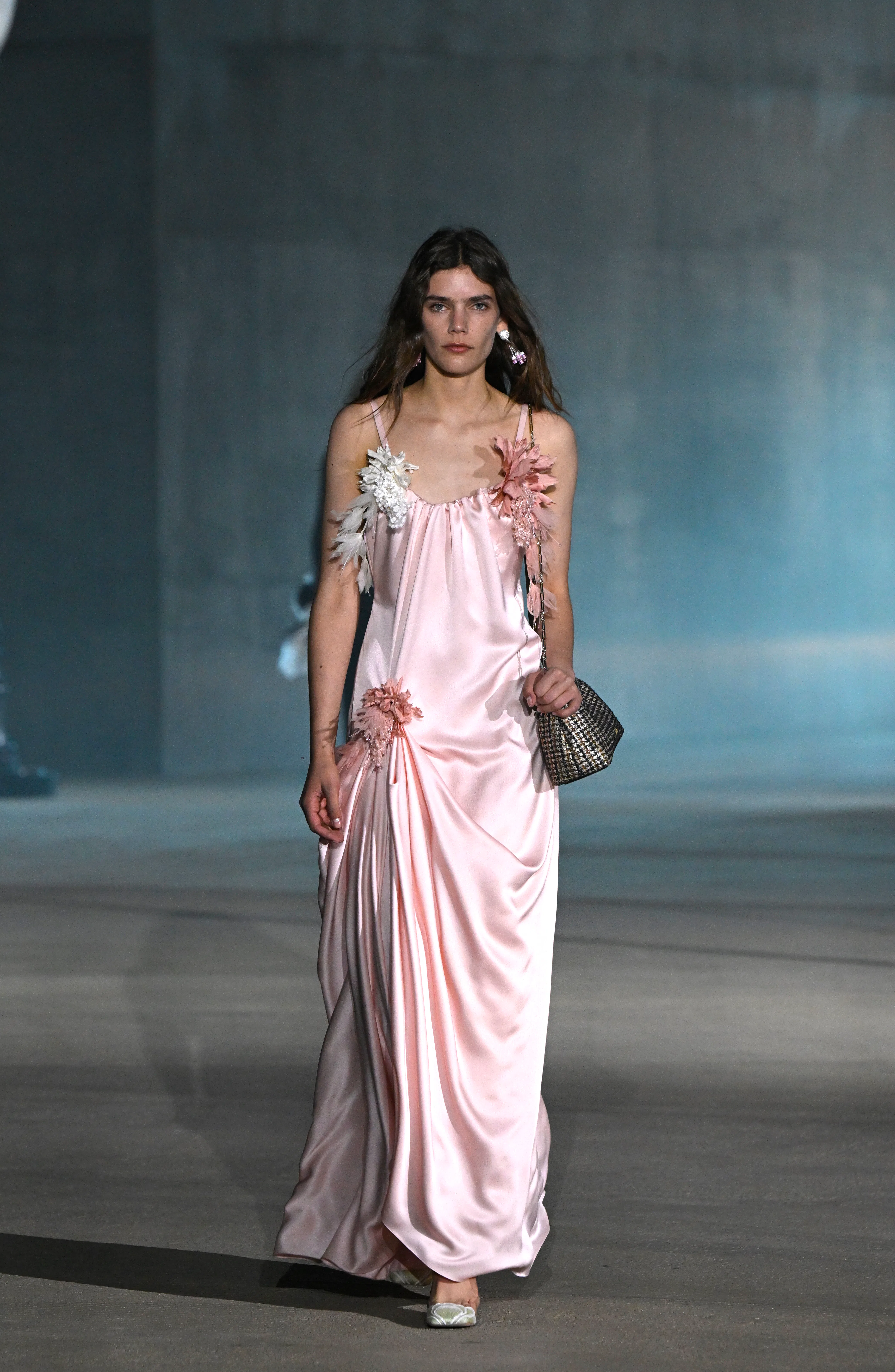 A model walks the runway at the Dior 2027 Cruise Collection Show held at LACMA 