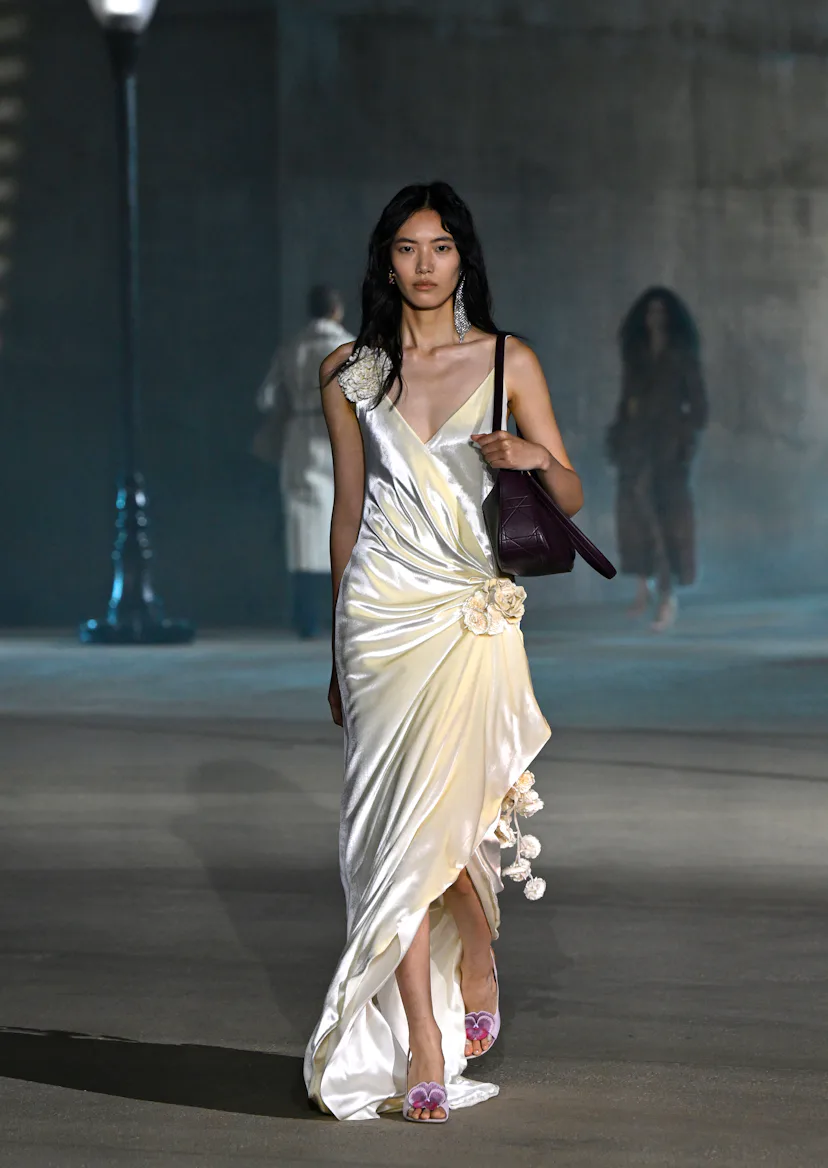 A model walks the runway at the Dior 2027 Cruise Collection Show
