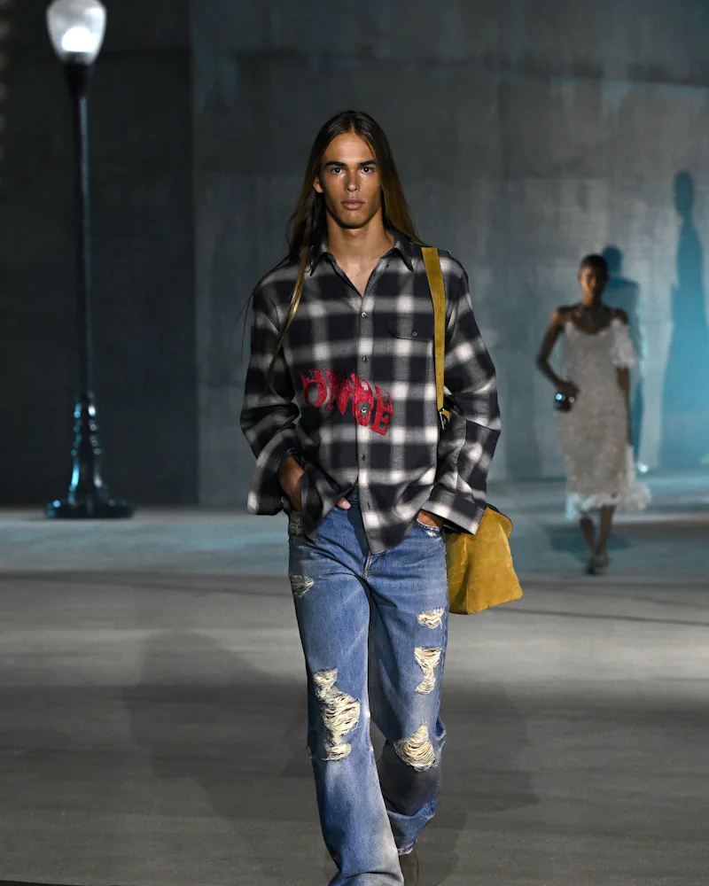 A model walks the runway at the Dior 2027 Cruise Collection Show