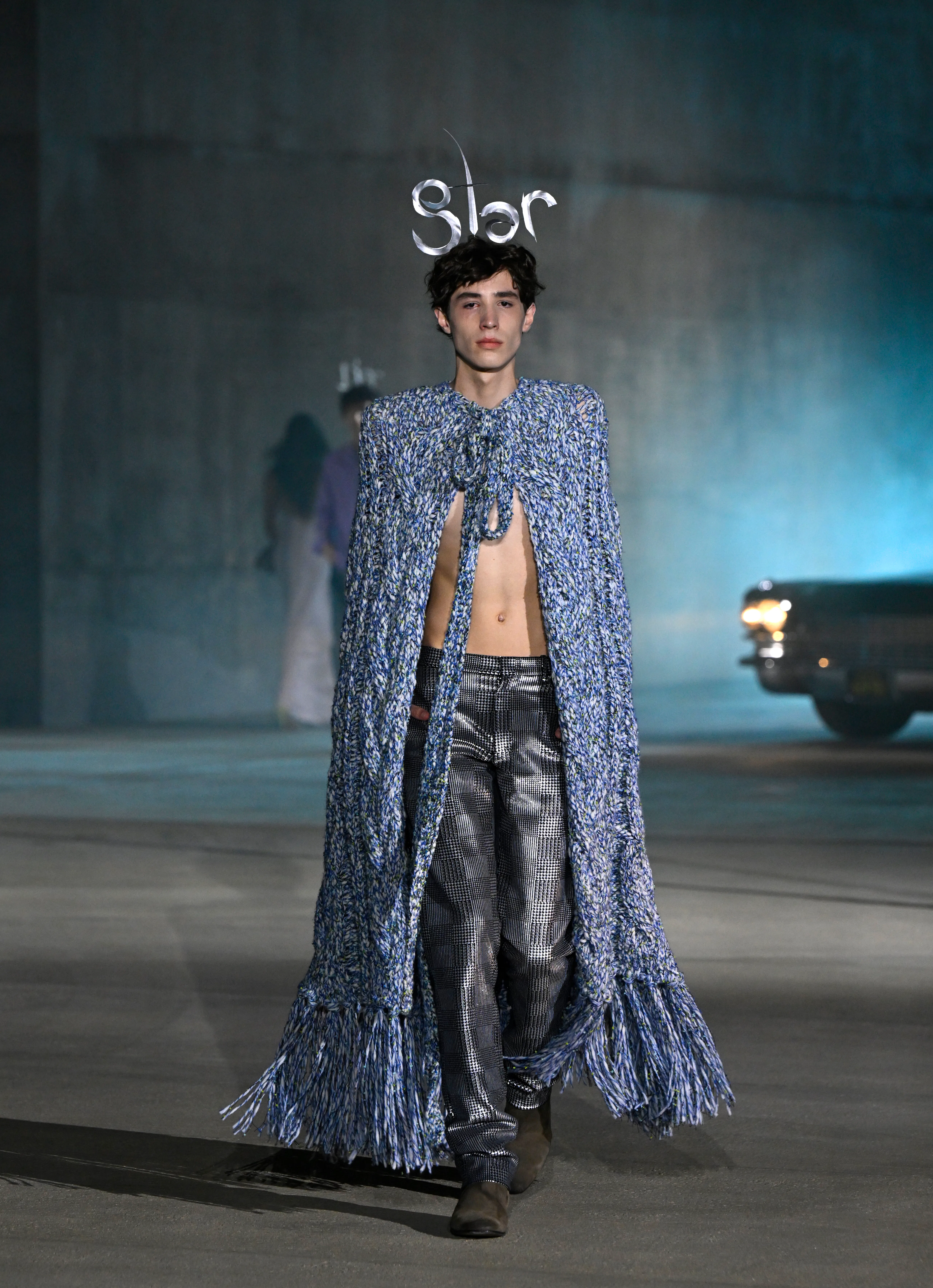 A model walks the runway at the Dior 2027 Cruise Collection Show