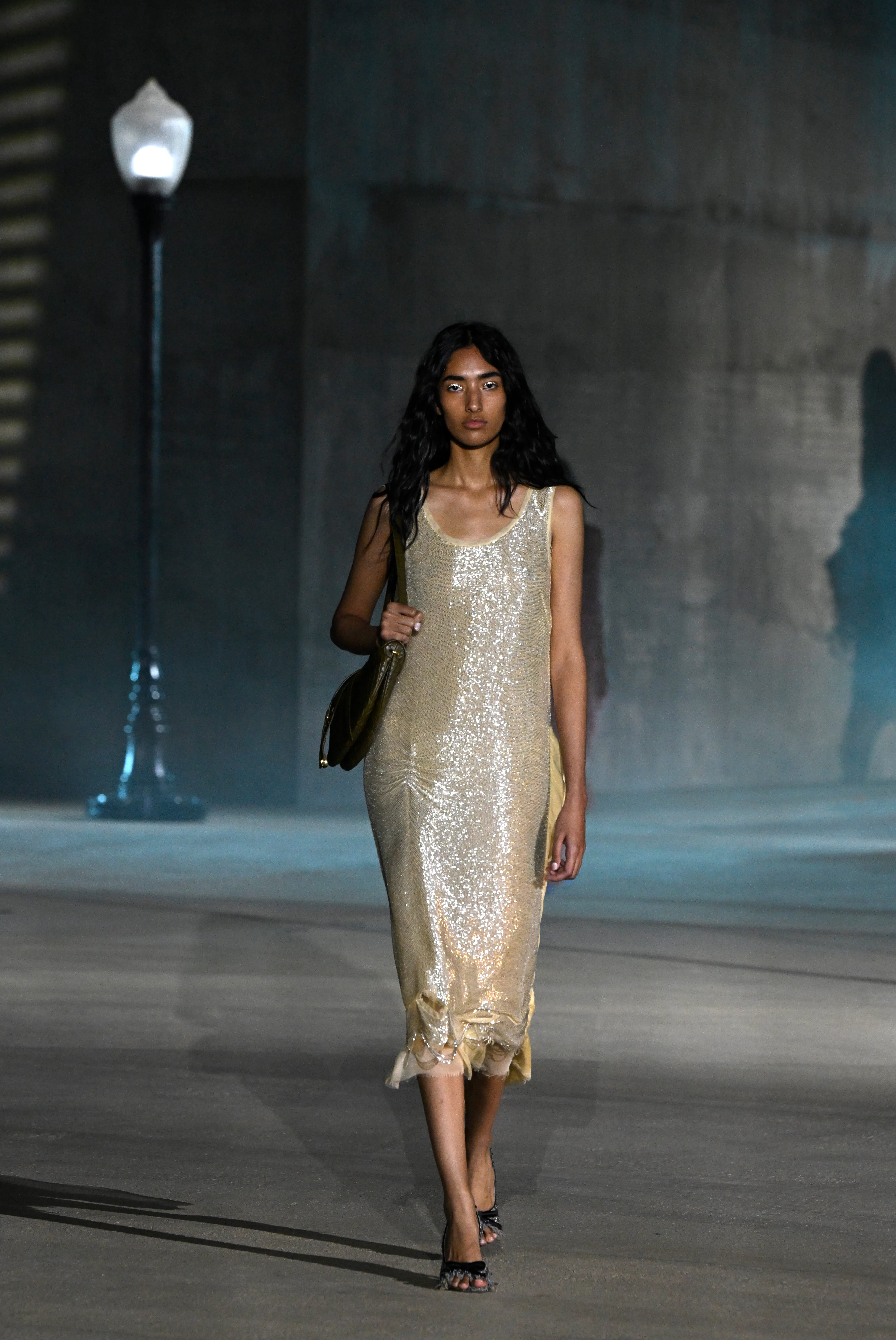 A model walks the runway at the Dior 2027 Cruise Collection Show