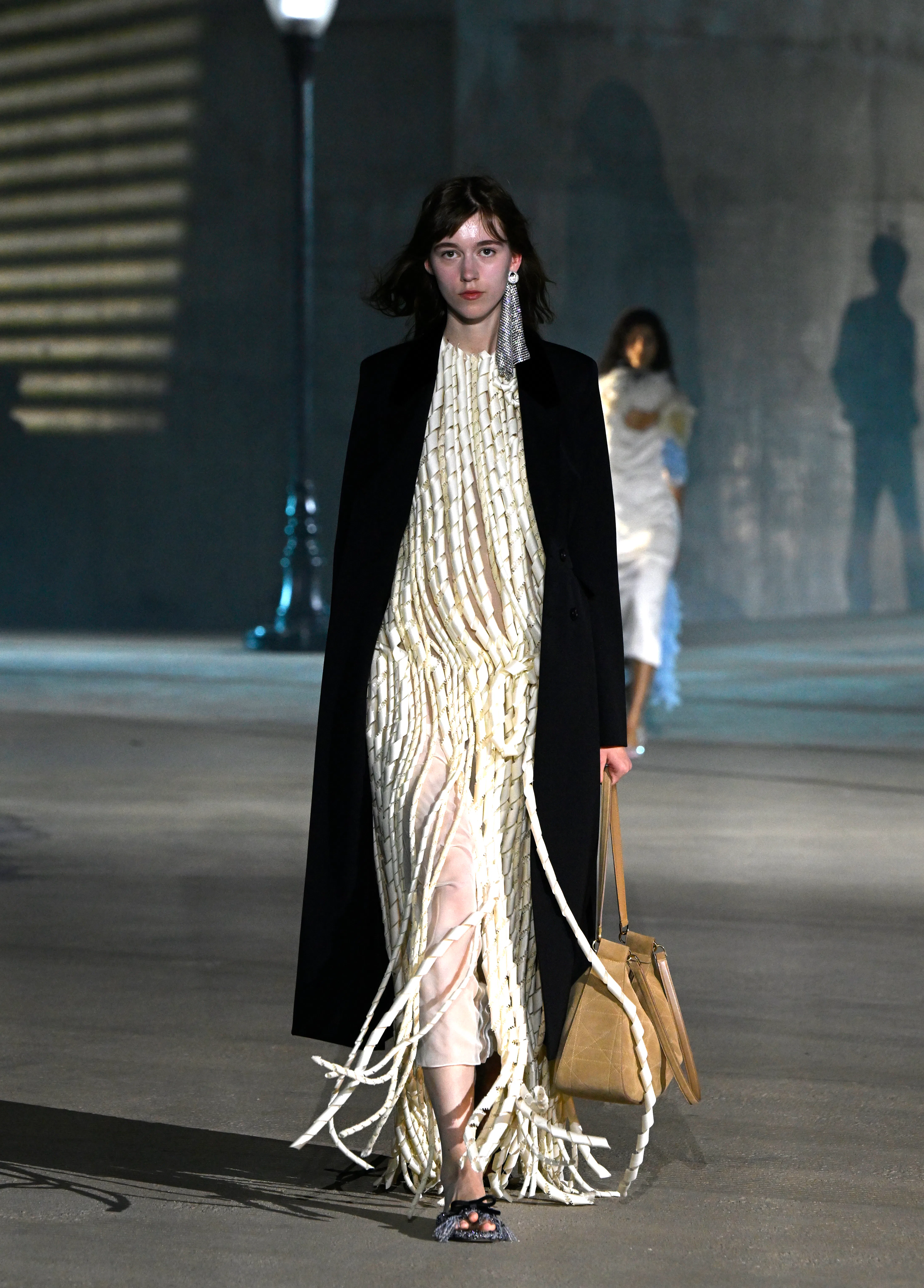 A model walks the runway at the Dior 2027 Cruise Collection Show 
