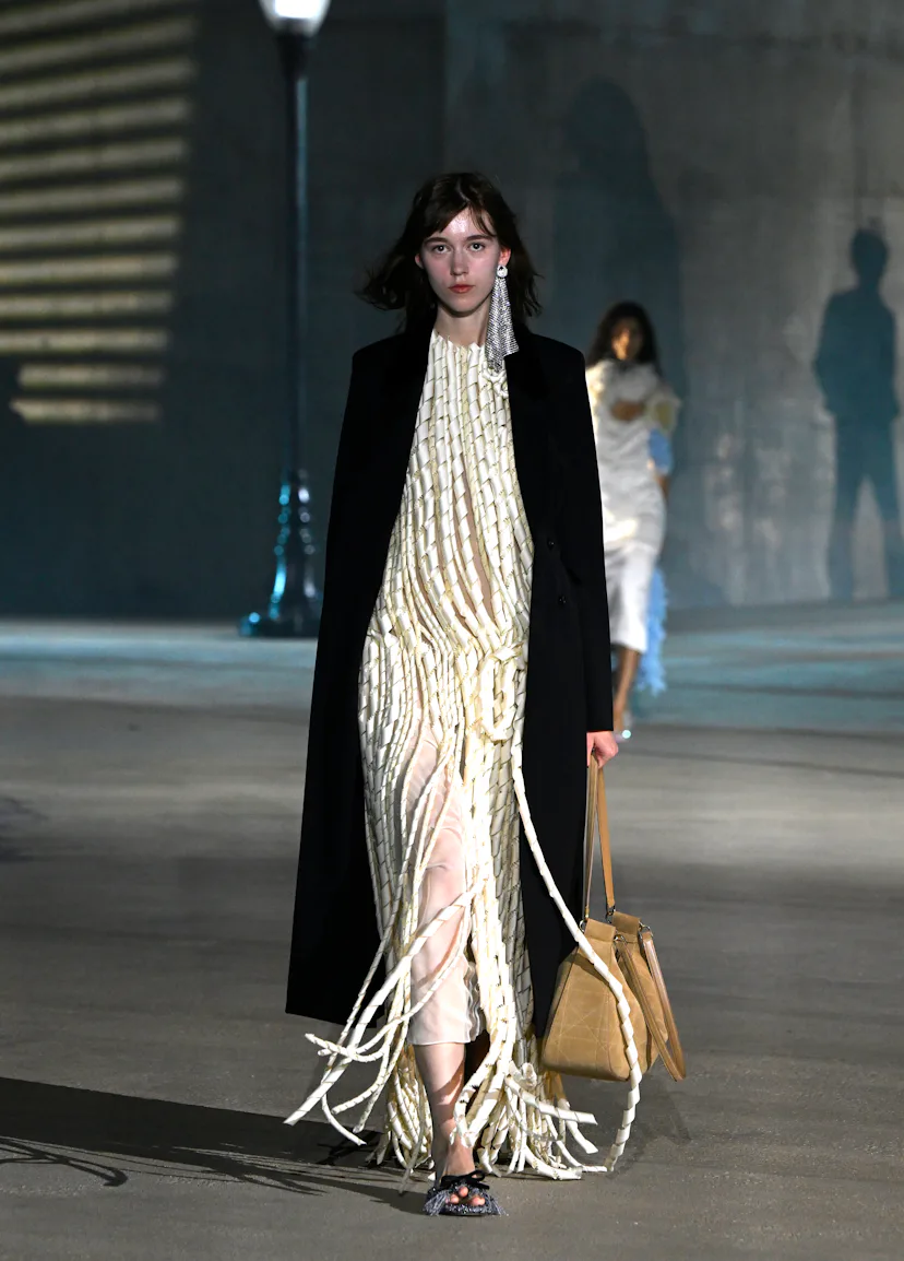 A model walks the runway at the Dior 2027 Cruise Collection Show