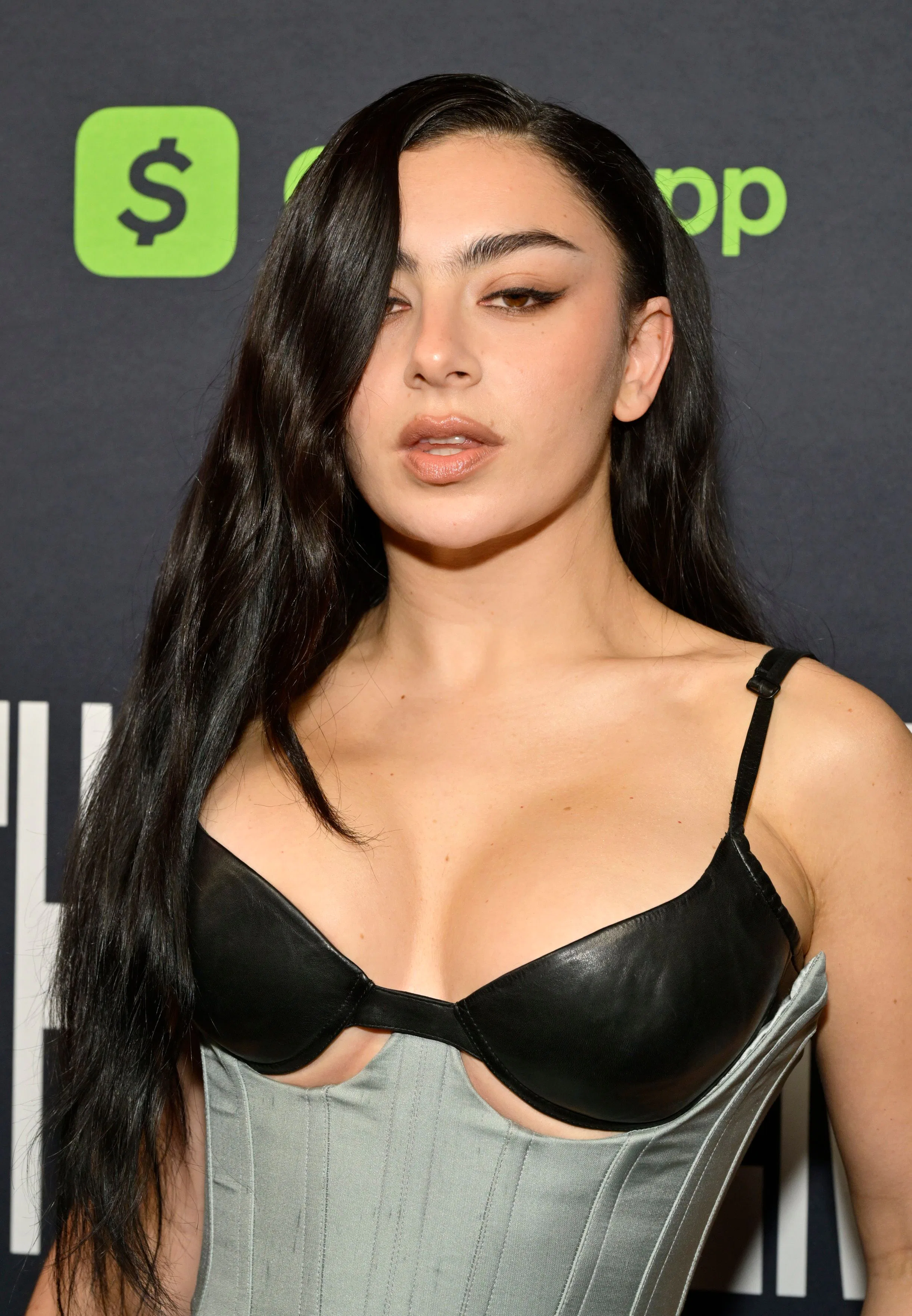 Charli XCX at the premiere of "The Moment" wearing simple makeup