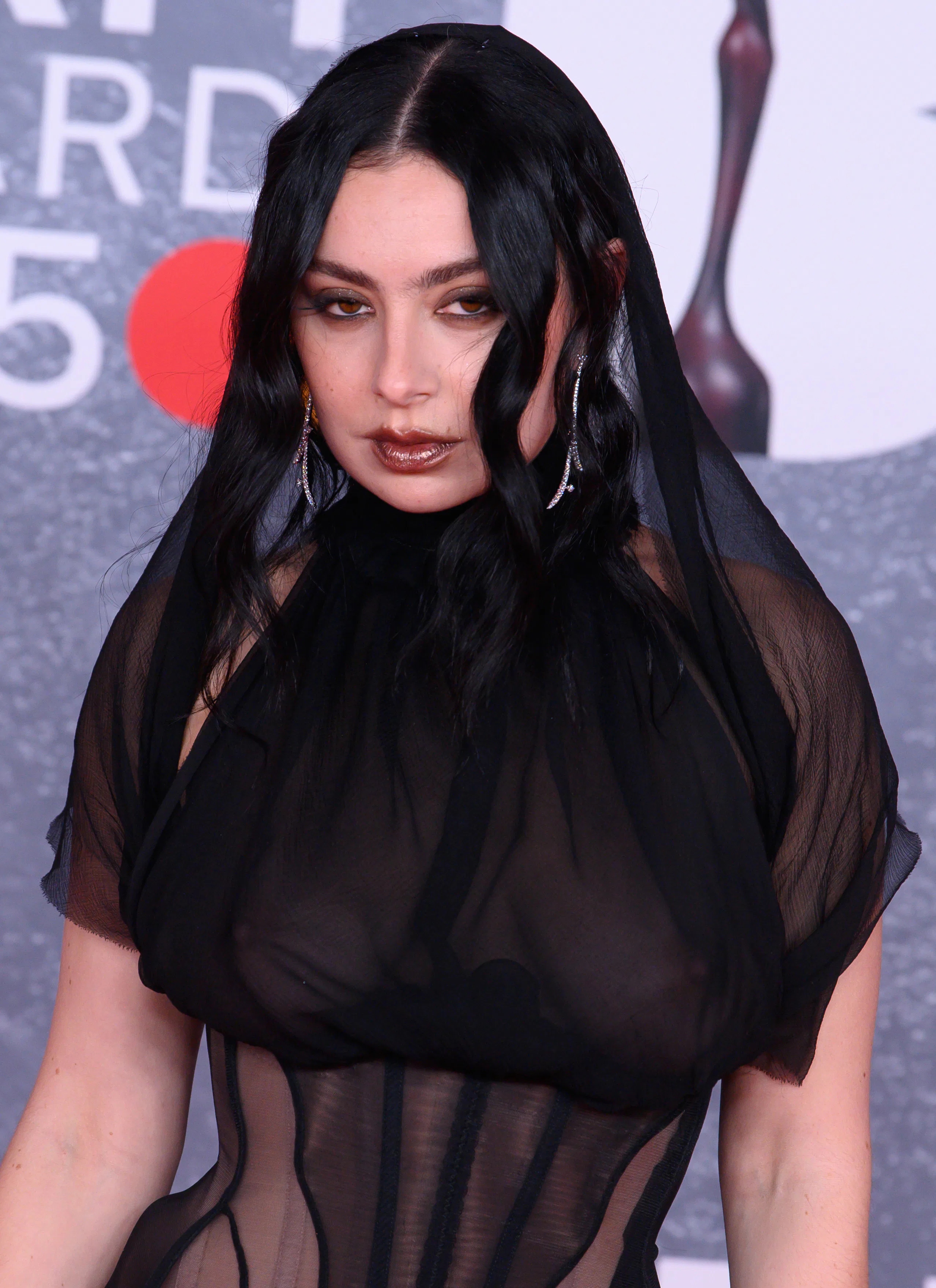 Charli XCX with frosted bronze lipstick