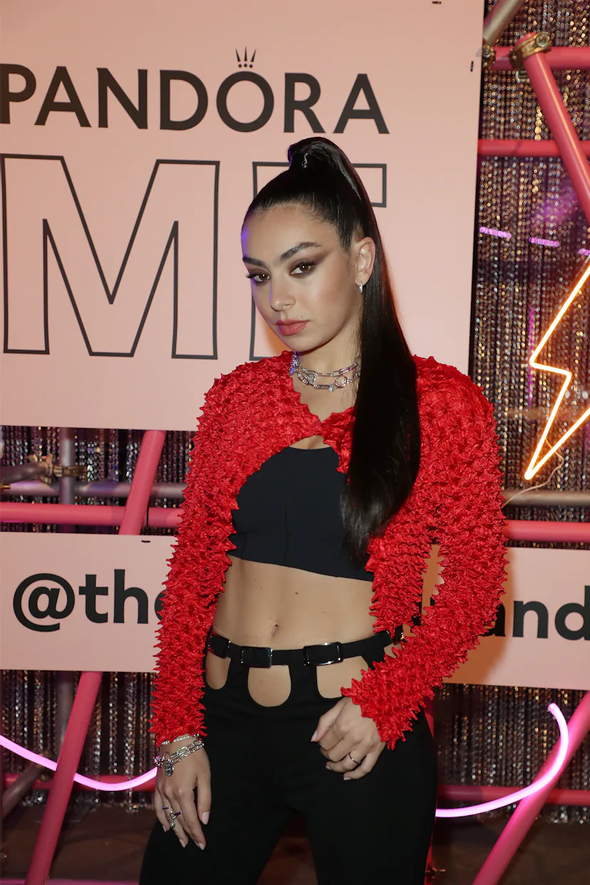 Charli XCX with a snatched high ponytail and snatched smoky eyeshadow