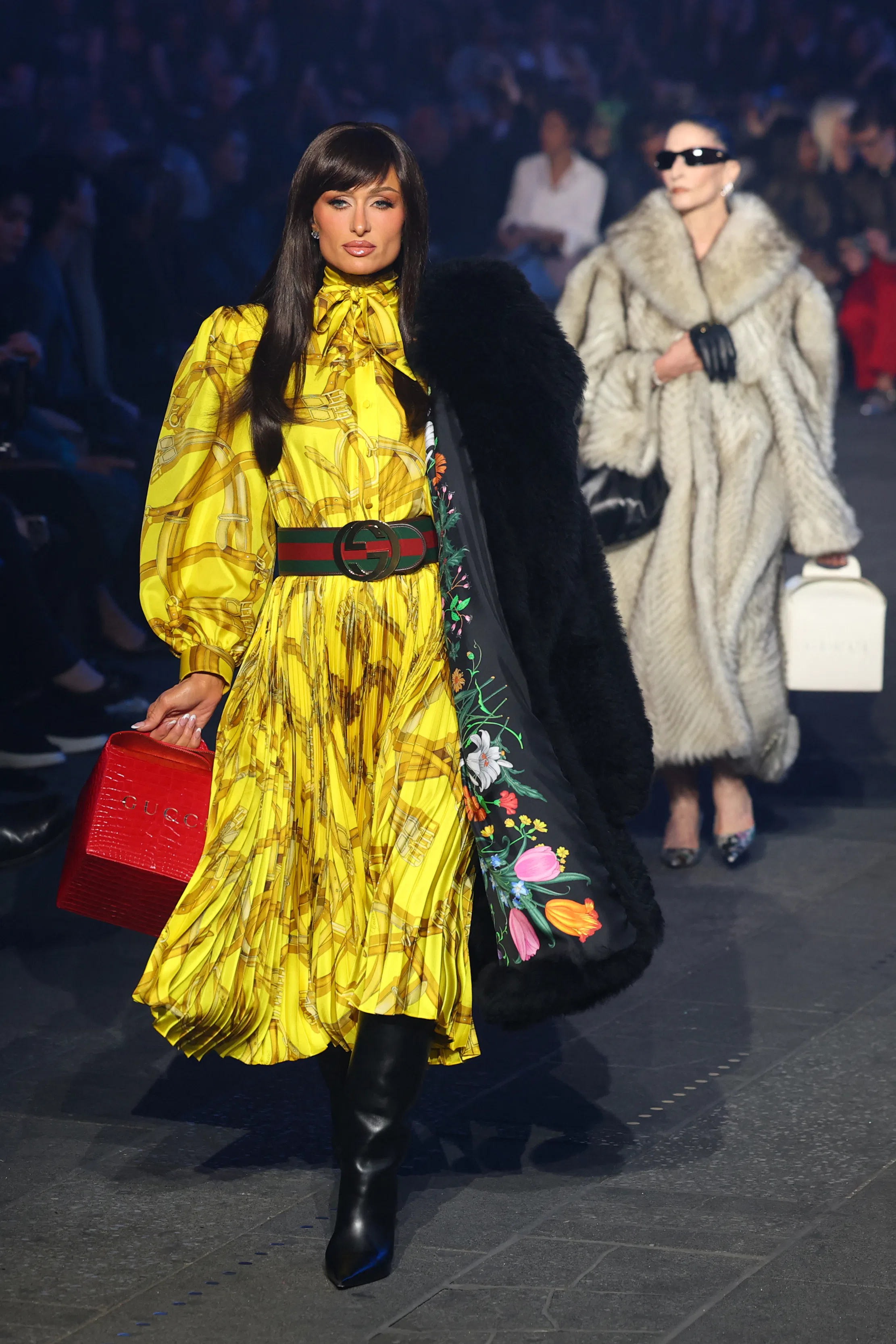 US socialite Paris Hilton walks the runway during the Gucci Cruise 2027 collection fashion show at T...