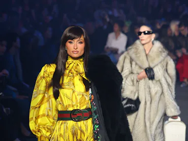US socialite Paris Hilton walks the runway during the Gucci Cruise 2027 collection fashion show at T...
