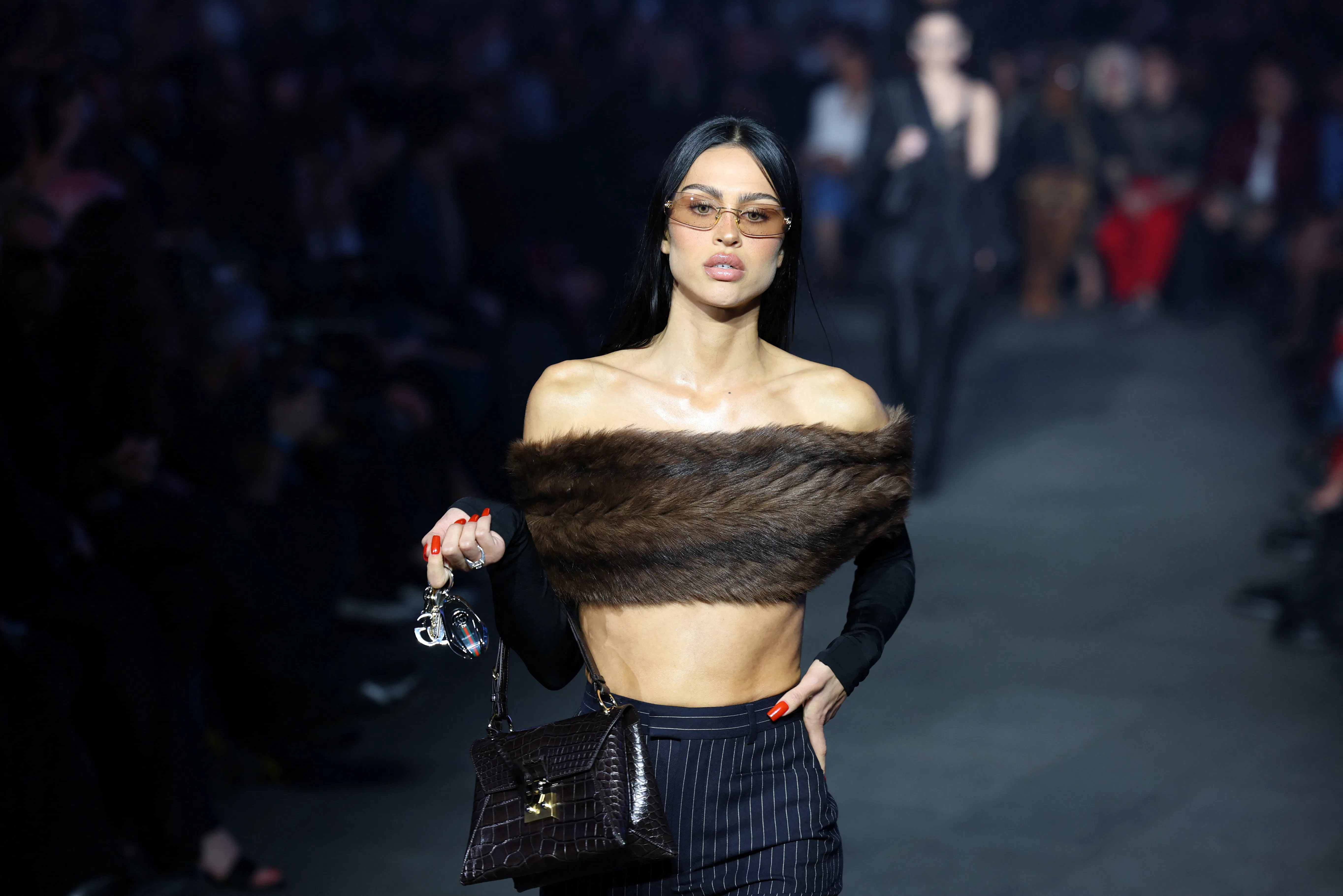 US model Amelia Gray walks the runway during the Gucci Cruise 2027 