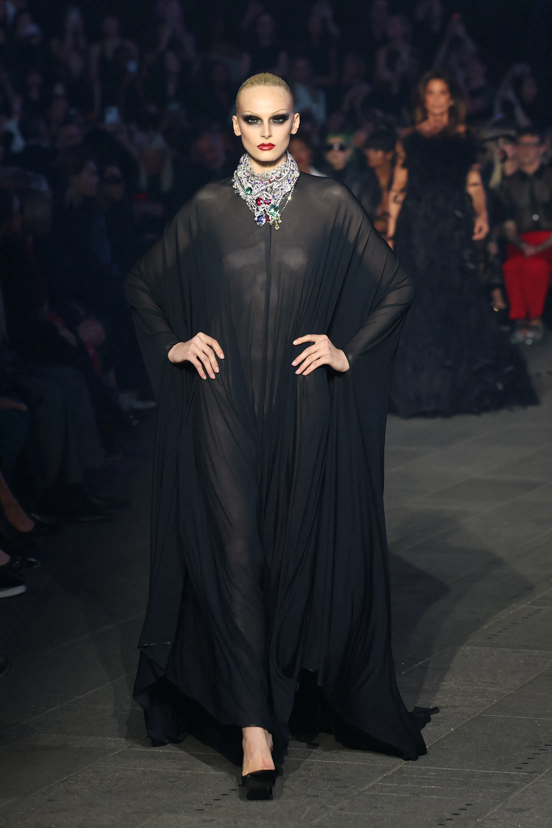 US model Alex Consani walks the runway during the Gucci Cruise 2027 