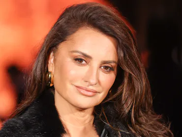 Penelope Cruz at the Chanel Womenswear Spring/Summer 2026 show with long brown hair