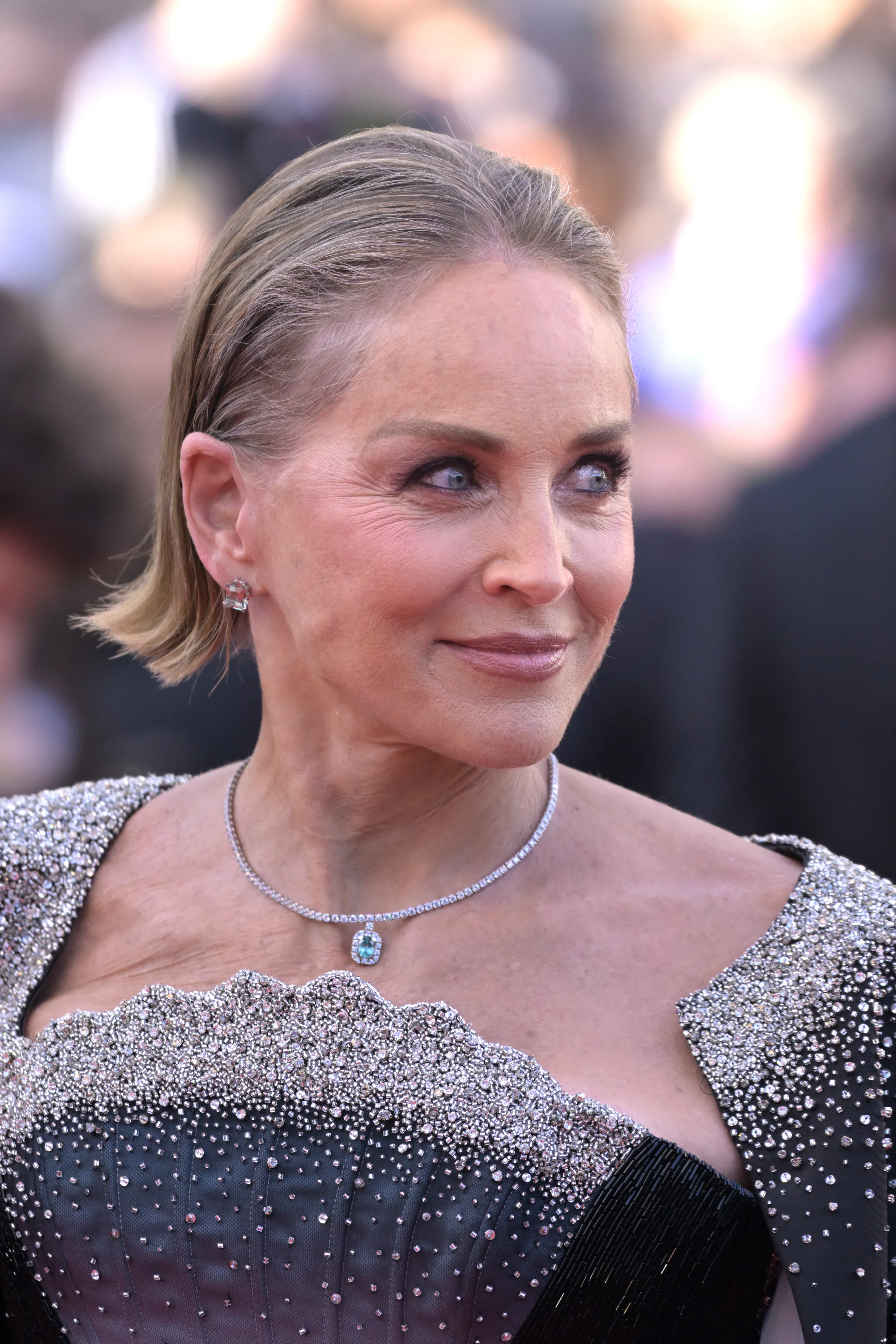 Sharon Stone at Cannes with cool, smoky glam makeup