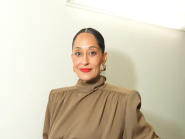 Tracee Ellis Ross wearing red lipstick