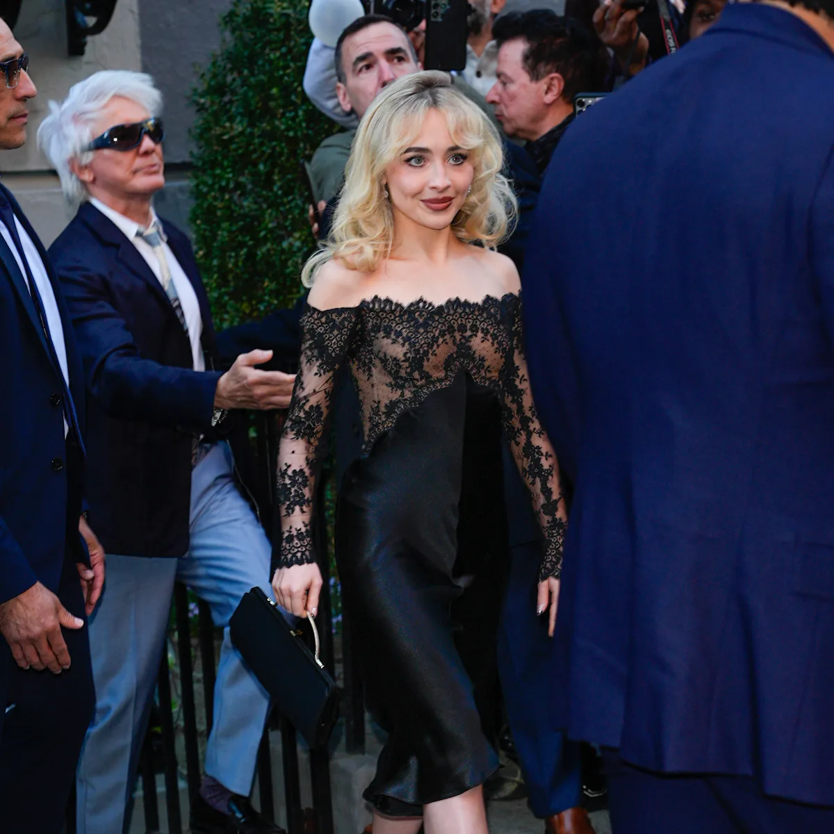 Sabrina Carpenter's Lacy Sheer Dress Gives Her Pin-Up Era an Uptown Polish Sabrina Carpenter's Lacy Sheer Dress Gives Her Pin-Up Era an Uptown Polish