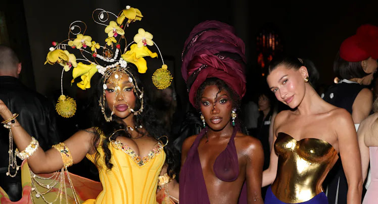 NEW YORK, NEW YORK - MAY 04: (L-R) Sza, Doechii and Hailey Bieber attend the 2026 Met Gala celebrati...