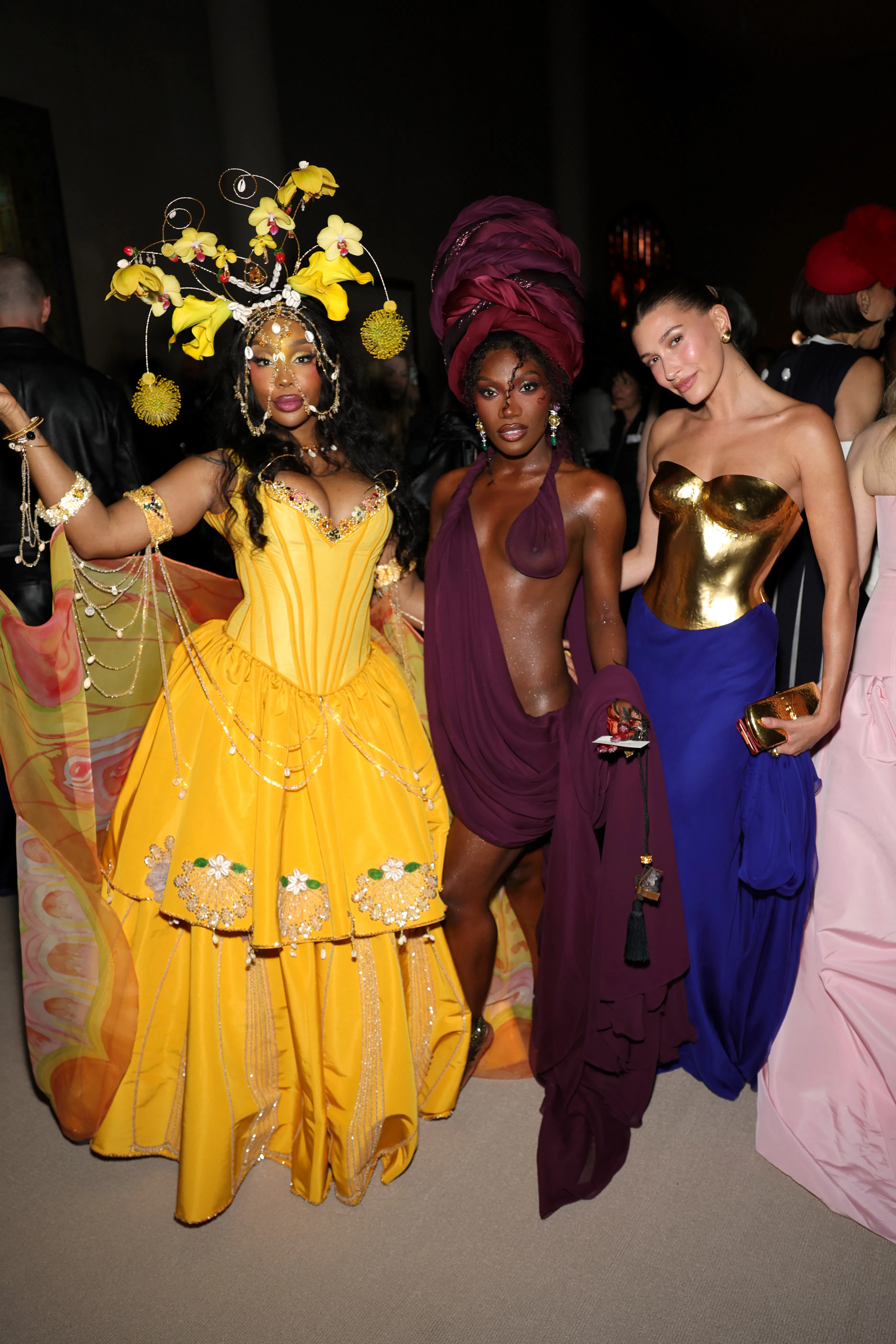 NEW YORK, NEW YORK - MAY 04: (L-R) Sza, Doechii and Hailey Bieber attend the 2026 Met Gala celebrati...