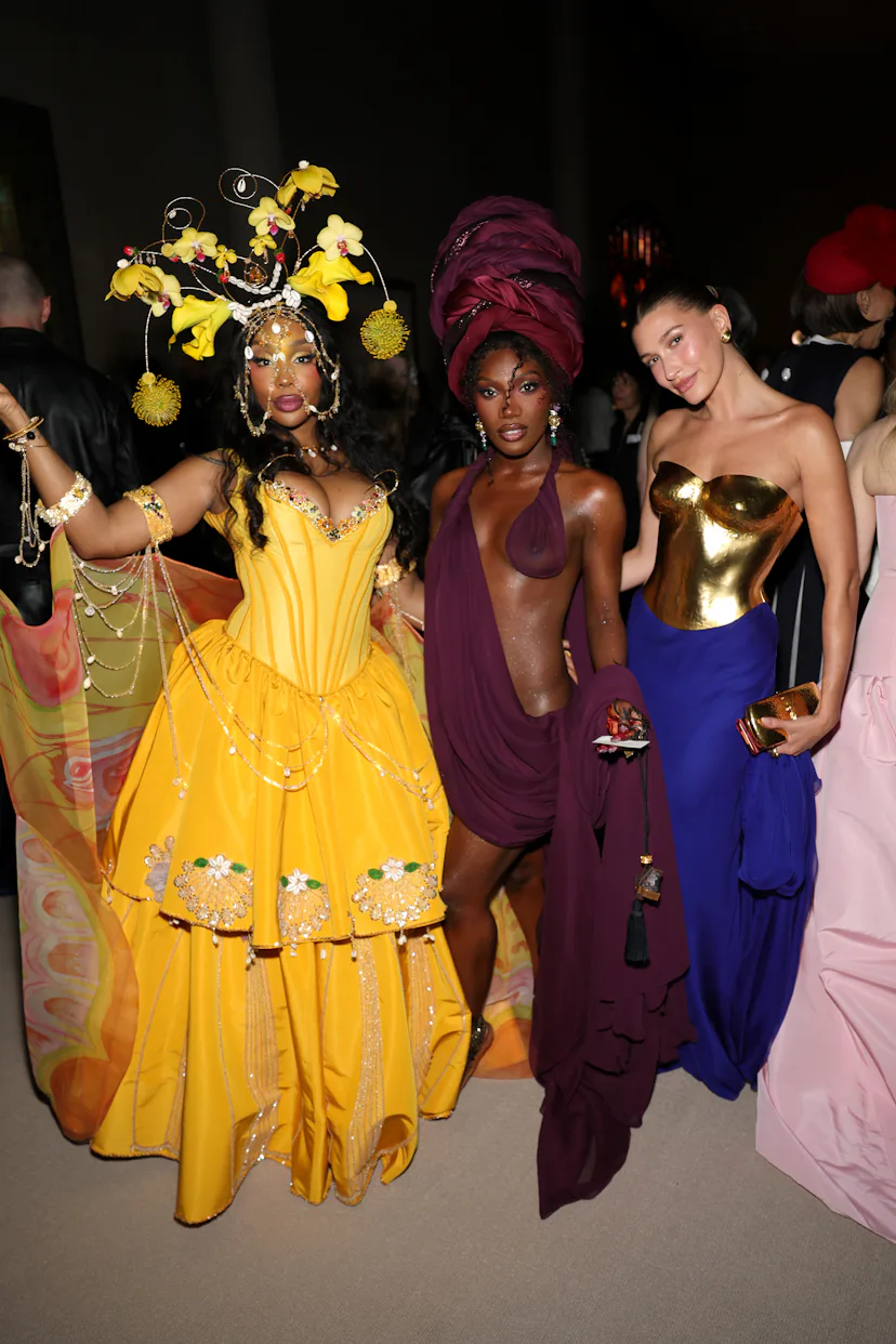 NEW YORK, NEW YORK - MAY 04: (L-R) Sza, Doechii and Hailey Bieber attend the 2026 Met Gala celebrati...