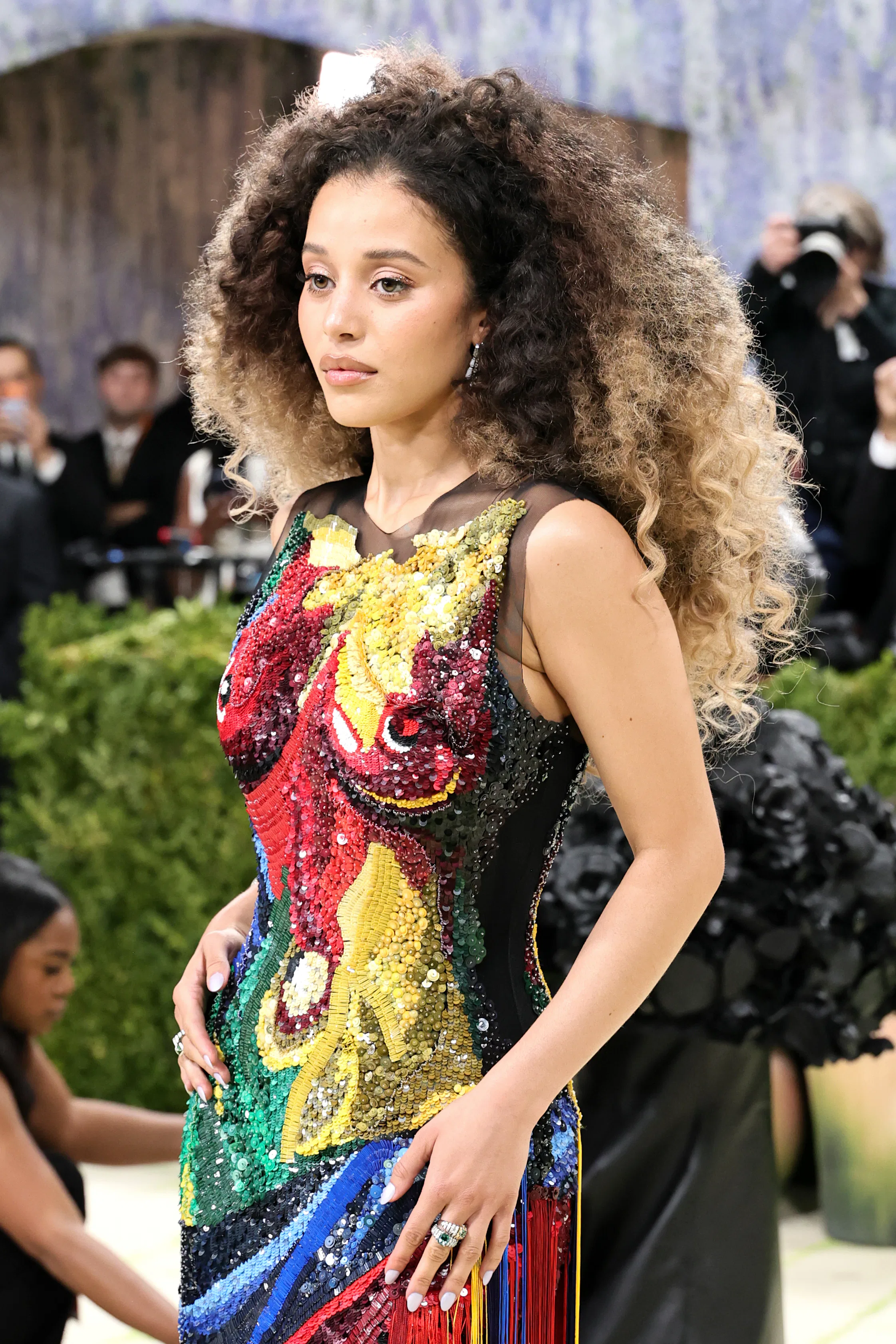 Chase Infiniti at the 2026 Met Gala with long blown-out curls